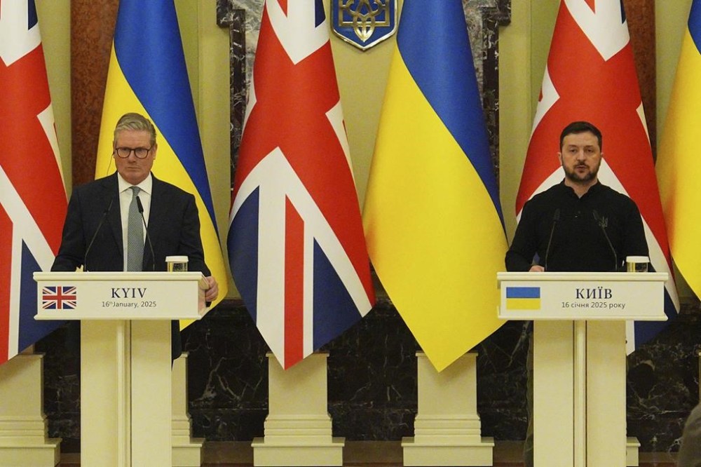 British Prime Minister Keir Starmer and President Volodymyr Zelensky, right, speak ahead of their bilateral talks at Mariinskyi Palace in Kyiv, Ukraine, Thursday, Jan. 16, 2025. (Carl Court, Pool Photo via AP)