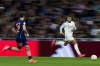 Real Madrid's Kylian Mbappe, right, controls a ball chased by Celta's Javi Rodriguez during a Copa del Rey round of 16 soccer match at the Santiago Bernabeu stadium in Madrid, Spain, Thursday, Jan. 16, 2025. (AP Photo/Pablo Garcia)