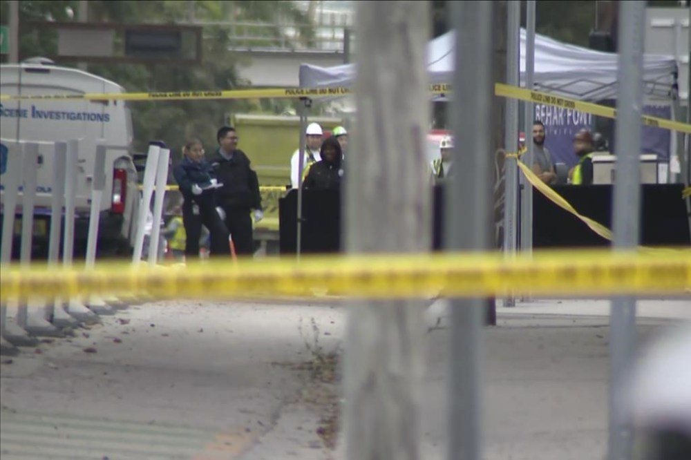 In this image made from video, a crime scene is taped off by Miami police after an “unprovoked” attack Thursday, Jan. 16. 2025, in Miami. (WPLG-TV via AP)