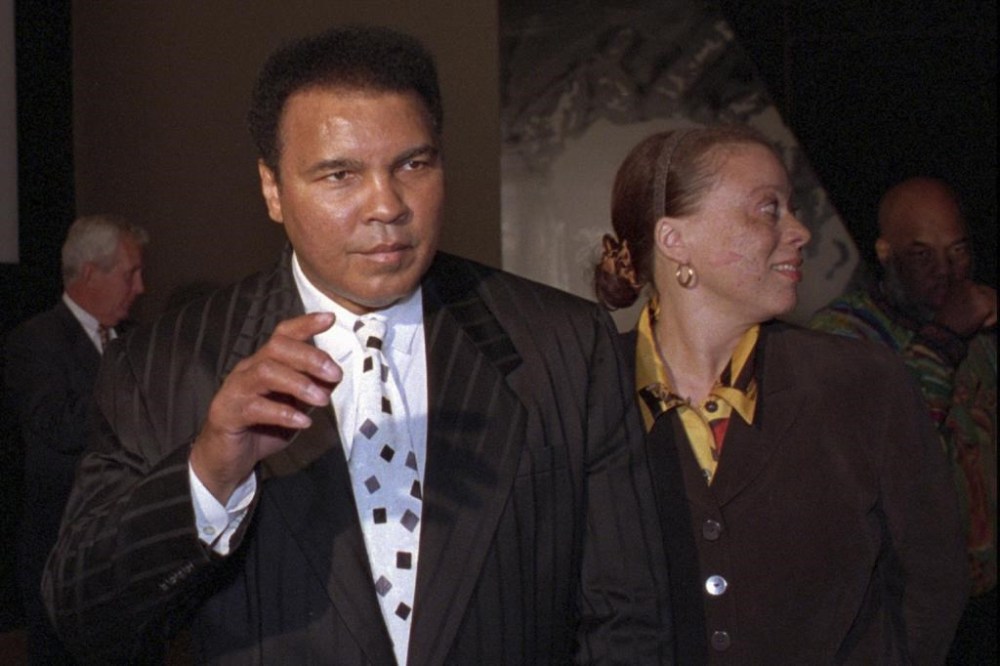 FILE - Muhammad Ali and his wife, Lonnie appear at a premiere for
