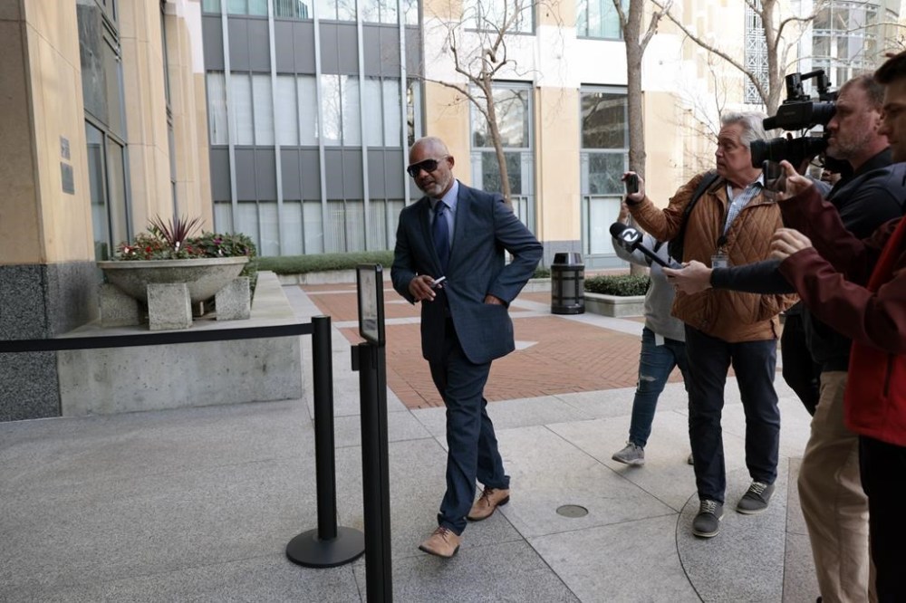 Andre Jones, along with his partner Sheng Thao, the former mayor of Oakland were criminally indicted by a federal grand jury after an FBI corruption investigation, arrives at the United States District Court in Oakland, Calif., on Friday, Jan. 17, 2025. (Santiago Mejia/San Francisco Chronicle via AP)