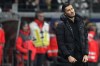 Dortmund's head coach Nuri Sahin grimaces during the German Bundesliga soccer match between Eintracht Frankfurt and Borussia Dortmund in Frankfurt, Germany, Friday, Jan. 17, 2025. (AP Photo/Michael Probst)