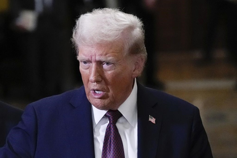 President-elect Donald Trump talks to reporters after a meeting with Republican leadership at the Capitol on Wednesday, Jan. 8, 2025, in Washington. THE CANADIAN PRESS/AP-Steve Helber
