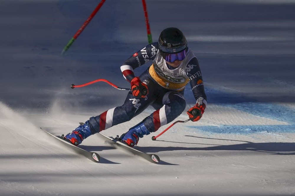 United States' Jacqueline Wiles speeds down the course during an alpine ski, women's World Cup downhill, in Cortina d'Ampezzo, Italy, Saturday, Jan. 18, 2025 (AP Photo/Marco Trovati)