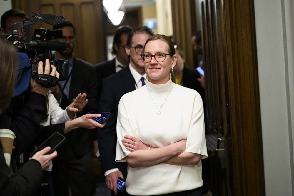 Leader of the Government in the House of Commons Karina Gould leaves the hallway of the Cabinet Room in West Block on Parliament Hill in Ottawa, on Monday, Dec. 16, 2024. THE CANADIAN PRESS/Justin Tang