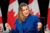 Former deputy prime minister and finance minister Chrystia Freeland speaks with reporters in Ottawa on Tuesday, Dec. 10, 2024. THE CANADIAN PRESS/Adrian Wyld