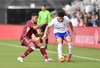 United States forward Caden Clark, right, battles Venezuela defender Anthony Graterol for the ball during the first half of an international friendly soccer game, Saturday, Jan 18, 2025, in Fort Lauderdale, Fla. (AP Photo/Michael Laughlin)