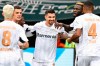 FILE - Leverkusen's Martin Terrier, middle celebrates a goal with his teammates during a match between TSG Hoffenheim and Bayer 04 Leverkusen on Saturday, Sept. 14, 2024 in Sinsheim, Germany. (Uwe Anspach/dpa via AP, File)