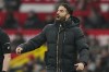 Manchester United's head coach Ruben Amorim follows the game during the English Premier League soccer match between Manchester United and Brighton and Hove Albion, at the Old Trafford stadium in Manchester, England, Sunday, Jan. 19, 2025. (AP Photo/Dave Thompson)