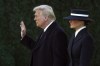 President-elect Donald Trump waves as he walks with his wife Melania after a church service at St. John's Episcopal Church across from the White House in Washington, Monday, Jan. 20, 2025, on Donald Trump's inauguration day. THE CANADIAN PRESS/AP/Matt Rourke