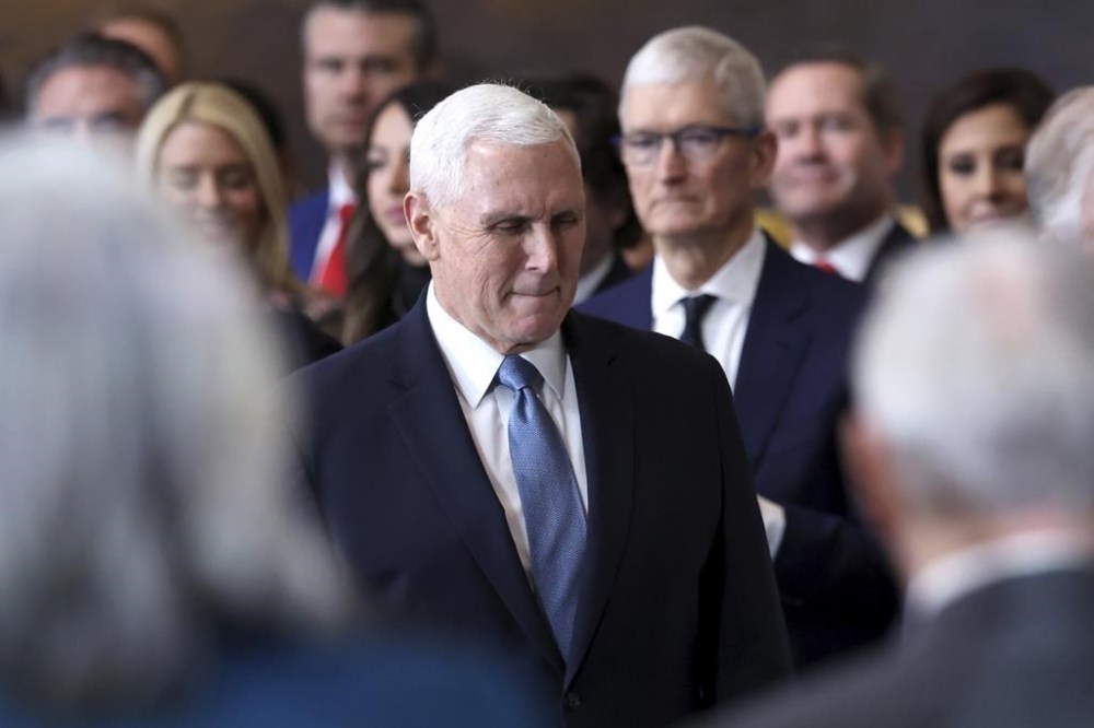 Former Vice President Mike Pence arrives before the 60th Presidential Inauguration in the Rotunda of the U.S. Capitol in Washington, Monday, Jan. 20, 2025. (Kevin Lamarque/Pool Photo via AP)