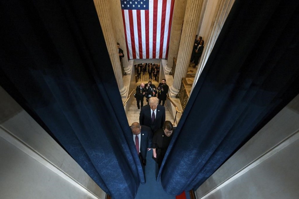 President-elect Donald Trump arrives at the 60th Presidential Inauguration in the Rotunda of the U.S. Capitol in Washington, Monday, Jan. 20, 2025. (Kenny Holston/The New York Times via AP, Pool)