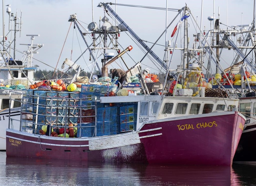 Fishing boats remain at the Dennis Point wharf in Lower West Pubnico, N.S., on Sunday, Nov. 27, 2022. THE CANADIAN PRESS/Andrew Vaughan