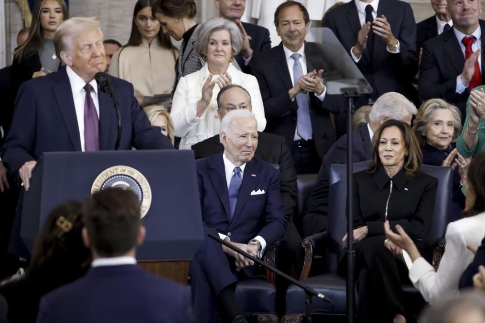 President Donald Trump delivers remarks after being sworn in as the 47th President of the United States during the 60th Presidential Inauguration in the Rotunda of the U.S. Capitol in Washington, Monday, Jan. 20, 2025, as former President Joe Biden and former Vice President Kamala Harris look on. (Shawn Thew/Pool photo via AP)