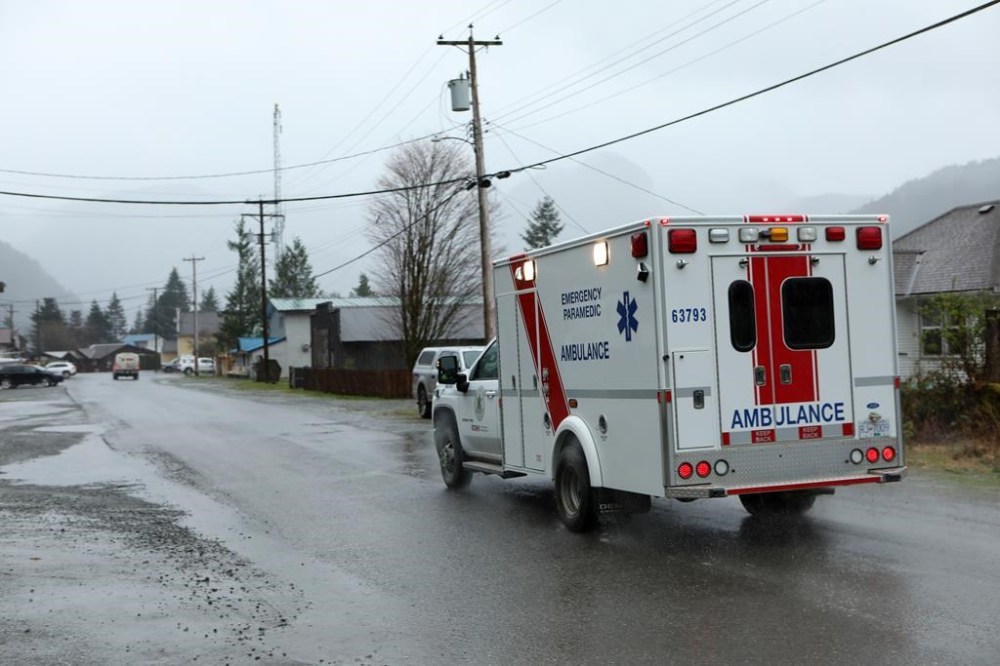 An ambulance drives through the village of Zeballos, B.C., on Tuesday April 2, 2024. THE CANADIAN PRESS/Chad Hipolito