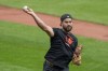 FILE - Baltimore Orioles right fielder Anthony Santander warms up during a baseball workout a day before the team's wild card playoff game against the Kansas City Royals, Monday, Sept. 30, 2024, in Baltimore. (AP Photo/Stephanie Scarbrough, File)