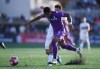 Pacific FC's Steffen Yeates, front right, and Vancouver Whitecaps' Andres Cubas vie for the ball during the first half of a Canadian Championship semifinal soccer match, in Langford, B.C., on Wednesday, July 10, 2024. THE CANADIAN PRESS/Darryl Dyck