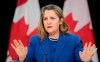 Former Deputy Prime Minister and Finance Minister Chrystia Freeland speaks with reporters in Ottawa, Tuesday, Dec. 10, 2024. THE CANADIAN PRESS/Adrian Wyld