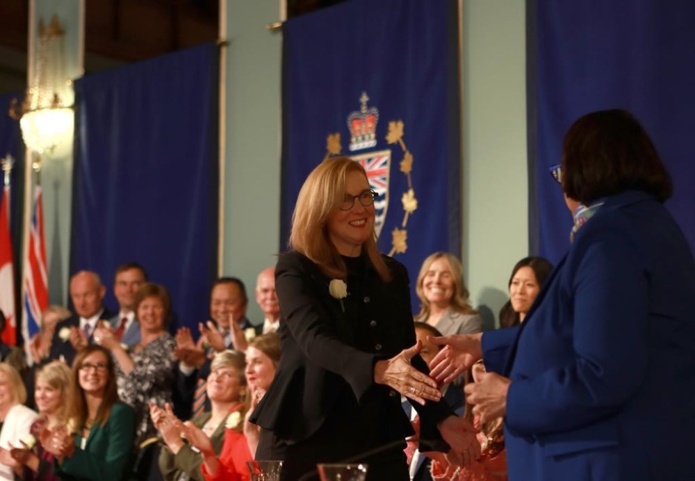 Finance Minister Brenda Bailey shakes hands with Lt.-Gov. Janet Austin during the swearing-in ceremony at Government House in Victoria, Monday, Nov. 18, 2024. THE CANADIAN PRESS/Chad Hipolito