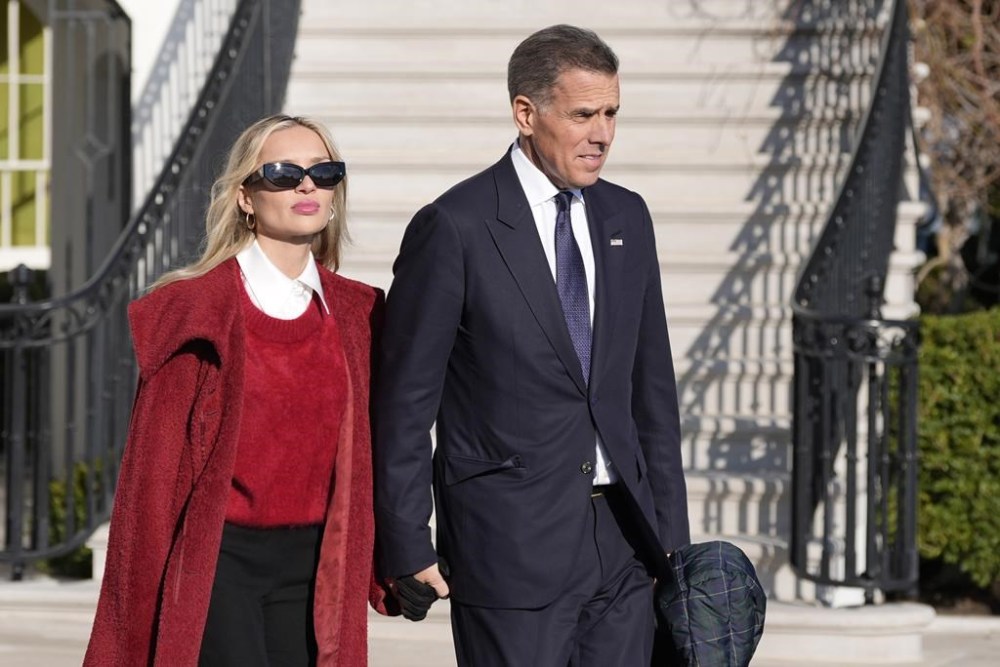 Hunter Biden and his wife Melissa Cohen Biden follow President Joe Biden and first lady Jill Biden as they walk to Marine One for departure from the South Lawn of the White House, Friday, Jan. 17, 2025, in Washington. (AP Photo/Alex Brandon)
