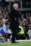 Real Madrid's coach Carlo Ancelotti yells during a Copa del Rey round of 16 soccer match against Celta de Vigo at the Santiago Bernabeu stadium in Madrid, Spain, Thursday, Jan. 16, 2025. (AP Photo/Pablo Garcia)