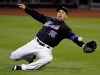 FILE - New York Mets right fielder Carlos Beltran lunges for the ball during the third inning of a baseball game against the Arizona Diamondbacks, April 22, 2011 at Citi Field in New York. (AP Photo/Bill Kostroun, file)