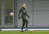Manchester City's Erling Haaland plays the ball during a training session in Manchester, England, Tuesday, Jan. 21, 2025, ahead of the Champions League soccer match between Paris Saint-Germain and Mancester City. (Martin Rickett/PA via AP)