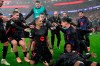 Barcelona's Raphinha celebrates his side's fifth goal during a Champions League opening phase soccer match between SL Benfica and FC Barcelona at the Luz stadium in Lisbon, Tuesday, Jan. 21, 2025. (AP Photo/Armando Franca)