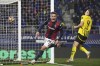 Bologna's Thijs Dallinga celebrates after scoring a goal during the Champions League soccer match between Bologna and Dortmund at Renato Dall'Ara Stadium on Bologna, Italy, Tuesday, Jan. 21, 2025. (Massimo Paolone/LaPresse via AP)
