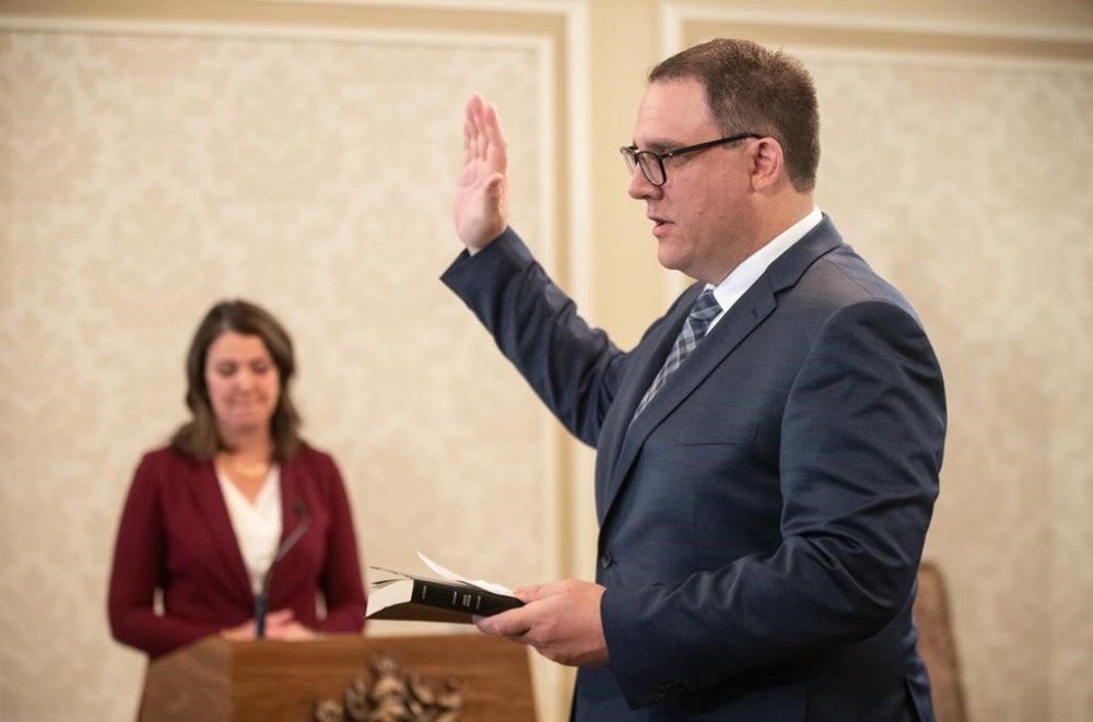 Minister of Seniors, Community and Social Services Jason Nixon is sworn into cabinet, in Edmonton, June 9, 2023. THE CANADIAN PRESS/Jason Franson