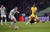 Celtic's Callum McGregor, left and Young Boys' Cheikh Niasse vie for the ball, during the Champions League, opening phase soccer match between Celtic and Young Boys, at Celtic Park, Glasgow, Scotland, Wednesday, Jan. 22, 2025. (Jane Barlow/PA via AP)