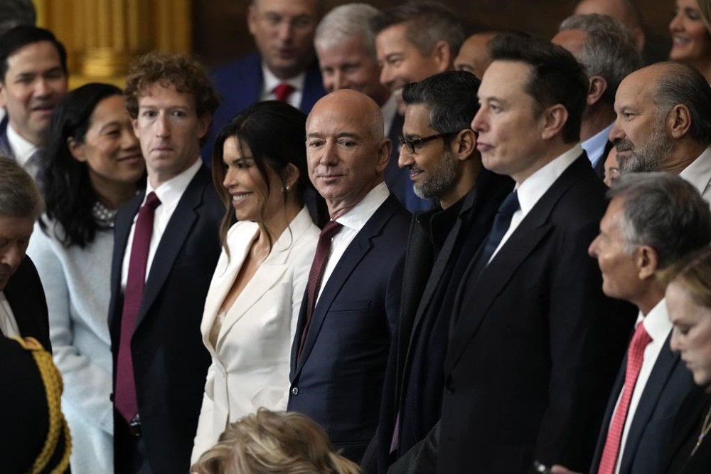 Guests including Mark Zuckerberg, Jeff Bezos, Sundar Pichai and Elon Musk, arrive before the 60th Presidential Inauguration in the Rotunda of the U.S. Capitol in Washington, Monday, Jan. 20, 2025. THE CANADIAN PRESS/AP-POOL, Julia Demaree Nikhinson