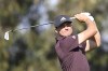 Ludvig Aberg hits his tee shot on the 8th hole of the North Course at Torrey Pines during the first round of the Farmers Insurance Open golf tournament Wednesday, Jan. 22, 2025, in San Diego. (AP Photo/Denis Poroy)
