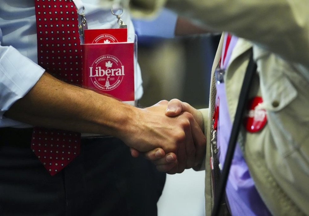 Prime Minister Justin Trudeau shakes hands as he takes part in the Liberal convention in Ottawa on Thursday, May 4, 2023. The federal Liberal caucus is meeting today and tomorrow on Parliament Hill as the party searches for its next leader. THE CANADIAN PRESS/Sean Kilpatrick