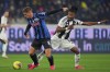 Atalanta's Mario Palasic, left, and Juventus' Khephren Thuram in action during the Serie A soccer match between Atalanta and Juventus at Gewiss Stadium in Bergamo, Italy, Tuesday Jan. 14, 2025. (Spada/LaPresse via AP)