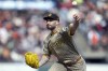 FILE 0 San Diego Padres pitcher Tanner Scott throws during a baseball game against the San Francisco Giants in San Francisco, Sunday, Sept. 15, 2024. (AP Photo/Jeff Chiu, File)