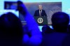 People follow a virtual speech of U.S. president Donald Trump at the Annual Meeting of World Economic Forum in Davos, Switzerland, Thursday, Jan. 23, 2025. THE CANADIAN PRESS/AP-Markus Schreiber
