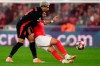 Barcelona's Ronald Araujo fights for the ball against Benfica's Vangelis Pavlidis during a Champions League opening phase soccer match between SL Benfica and FC Barcelona at the Luz stadium in Lisbon, Tuesday, Jan. 21, 2025. (AP Photo/Armando Franca)