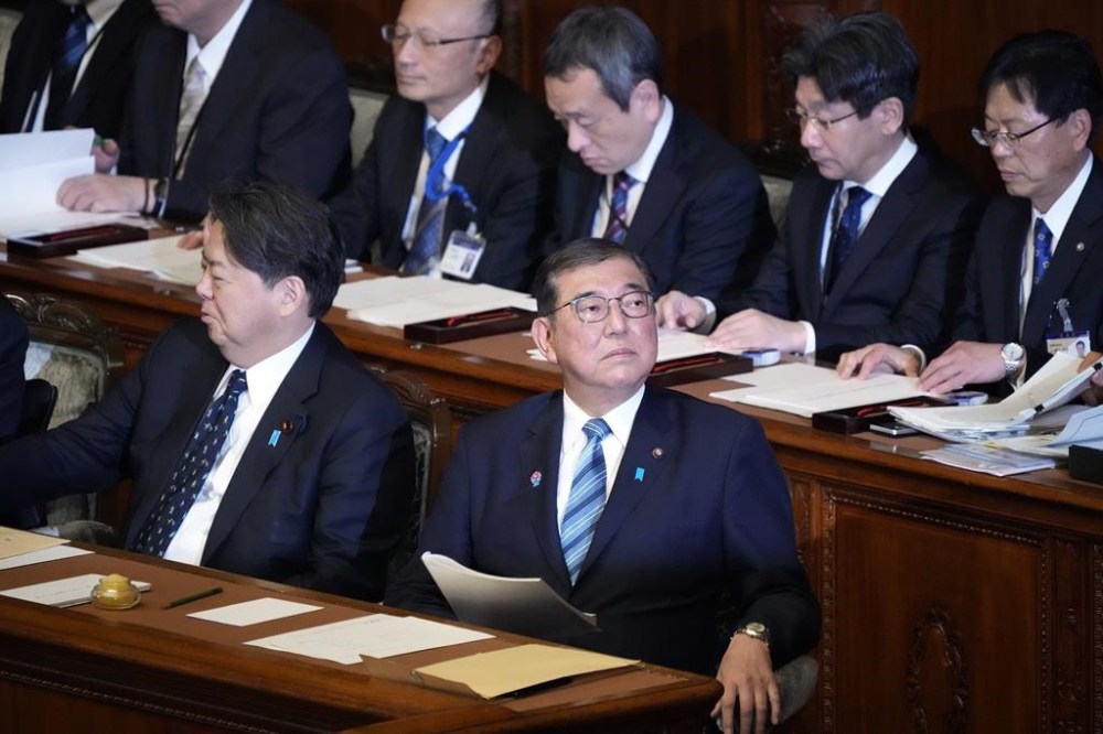 Japan's Prime Minister Shigeru Ishiba prepares to deliver a policy speech marking the start of this year's parliamentary session in Tokyo, Friday, Jan. 24, 2025. (AP Photo/Eugene Hoshiko)