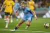 FILE - England's Georgia Stanway reaches for the ball during the Women's World Cup semifinal soccer match between Australia and England at Stadium Australia in Sydney, Australia, Wednesday, Aug. 16, 2023. (AP Photo/Rick Rycroft, File)
