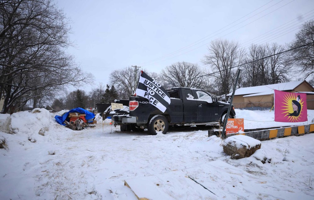 RUTH BONNEVILLE / FREE PRESS
People protesting the development of the Lemay Forest continue to barricade the entrance to the area even after a temporary injunction that was granted by the courts late Monday to leave the area.