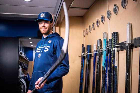 Jets captain Adam Lowry is out with an upper-body injury. (Mikaela MacKenzie / Free Press files)