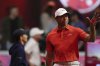 Tiger Woods of Jupiter Links Golf Club waves to fans as he is introduced at the start of a match of the TMRW Golf League (TGL) against Boston Common Golf, Monday, Jan. 27, 2025, in Palm Beach Gardens, Fla. (AP Photo/Rebecca Blackwell)
