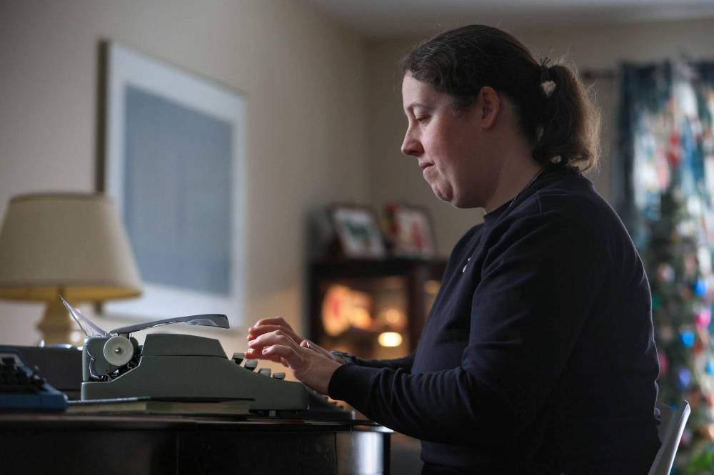 Corah Enns, a music teacher at École Dugald School, has a modest number of four or five vintage typewriters at home, but keeps most of her collection at school, to use as teaching tools for students. (Ruth Bonneville / Free Press)