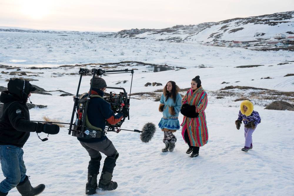 JASPER SAVAGE / APTN / CBC / NETFLIX
From left: Maika Harper, Anna Lambe and Hope Akeeagok, who is Keira Cooper’s stand-in, on the North of North set.