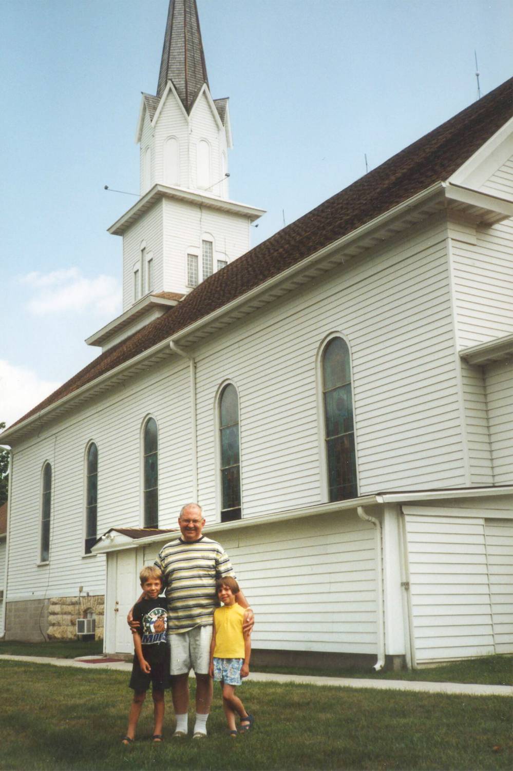 SUPPLIED
Ted Chell with his grandchildren outside his family’s church in rural Minnesota.