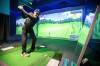 photos by MIKAELA MACKENZIE / FREE PRESS 
                                Darrin Stevenson plays a round Friday at Golf Square (106 Scurfield Blvd.). &lsquo;Compared to outside (golf), it can show you more data,&rsquo; business owner June Kang says of the sensor-laden sport.