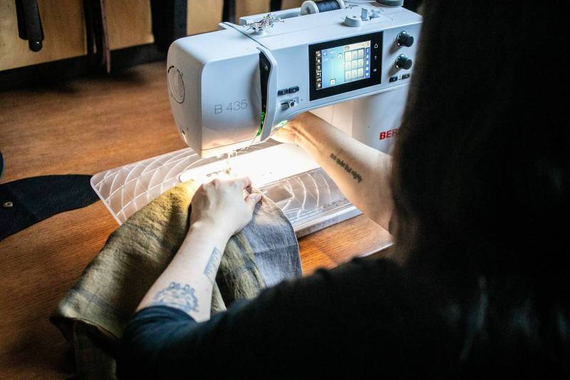 Crystal Salkeld sews a bento bag in her studio. (Mikaela MacKenzie / Free Press)