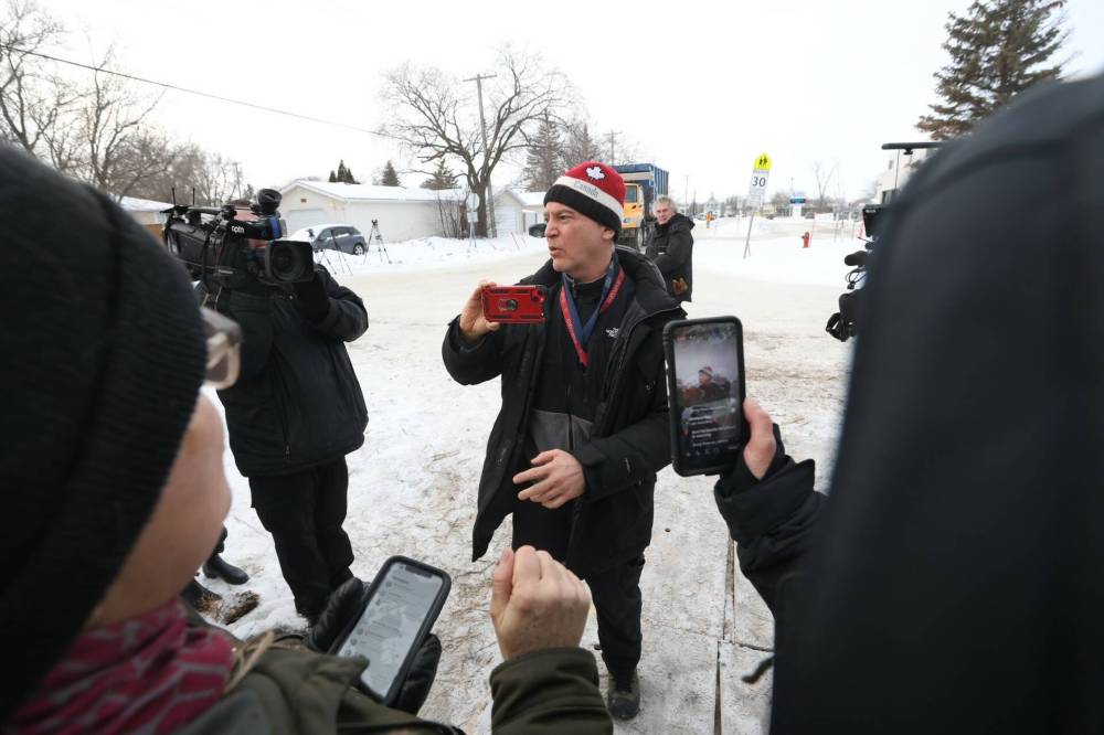 MIKE DEAL / FREE PRESS
John Wintrup tells protesters to move at Lemay Forest on Wednesday. (Mike Deal / Free Press)