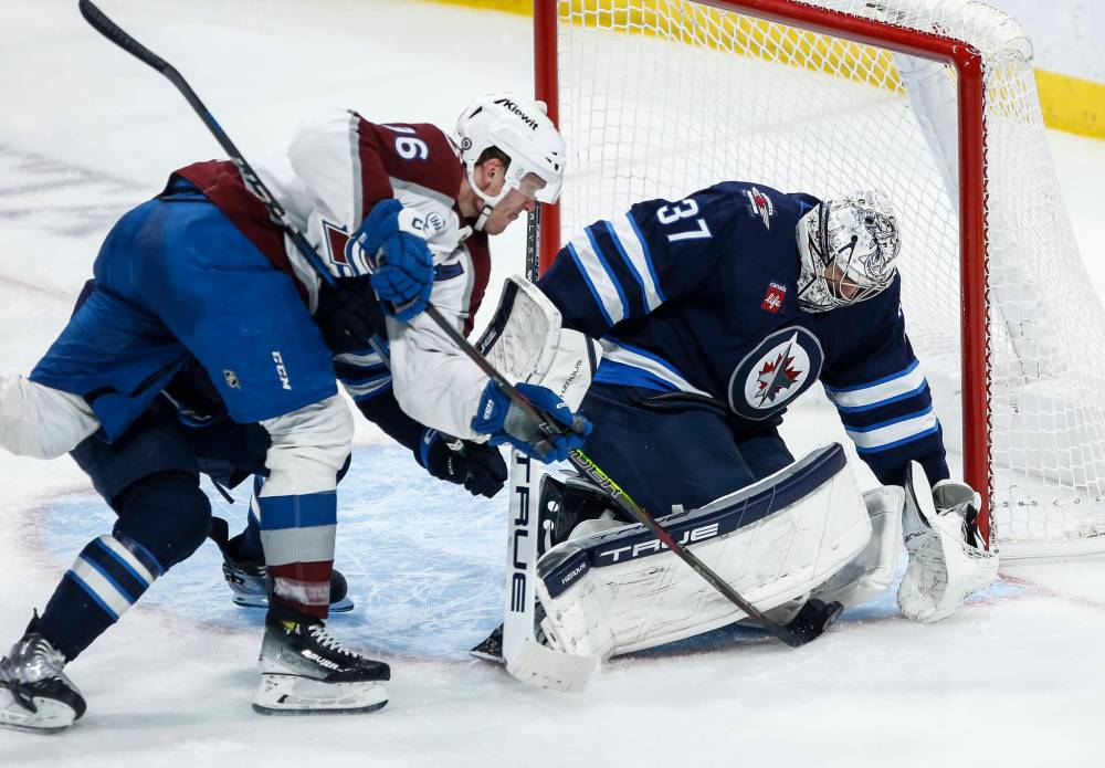 John Woods / THE CANADIAN PRESS
Jets goaltender Connor Hellebuyck recorded his sixth shutout of the season Saturday night against the Colorado Avalanche.